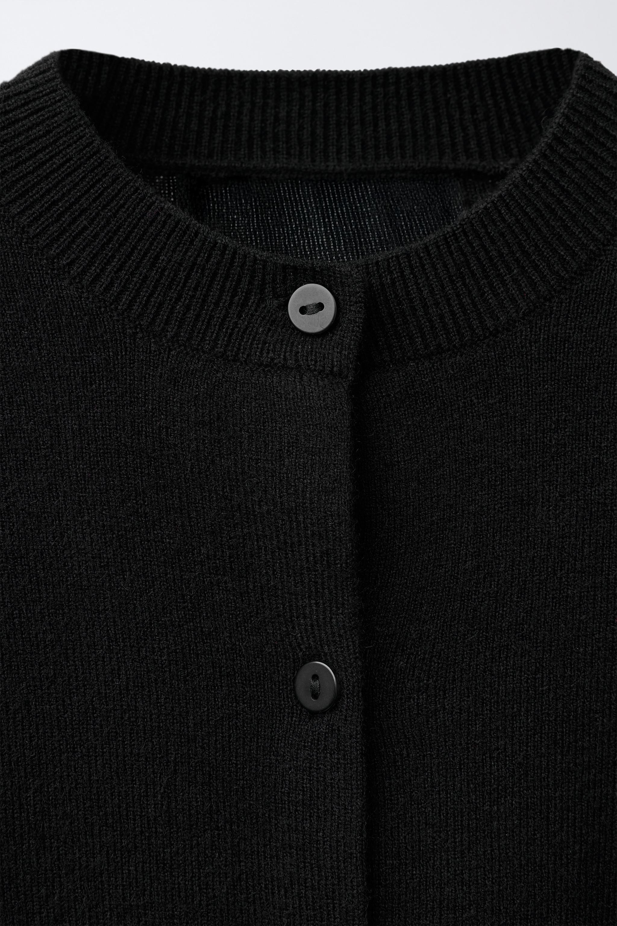 KNIT CARDIGAN WITH DETACHABLE FEATHERS